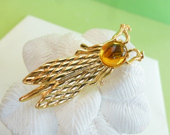Yves Rocher brooch, vintage 80/90, "Cigale", metal and resin (?, or plastic), gold and honey yellow colors.