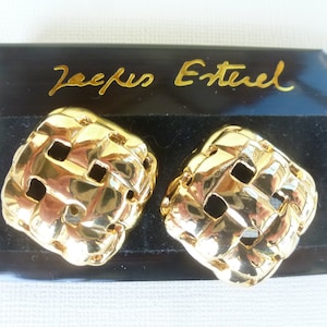 Vintage French 80s Jacques Esterel ear clips, metal, gold color.
