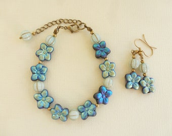 Set floreale "Piccoli fiori bicolore" in vetro e metallo, blu scuro e azzurro, nero e oro.