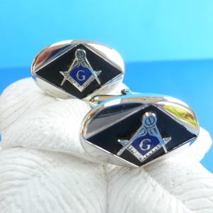 Gemelos Swank, vintage 60, metal, plata, negro y azul marino.