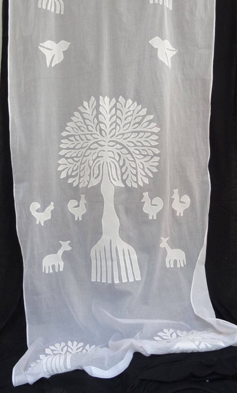 COTTON AND ORGANDI white with cutout and applique of a tree of life pattern