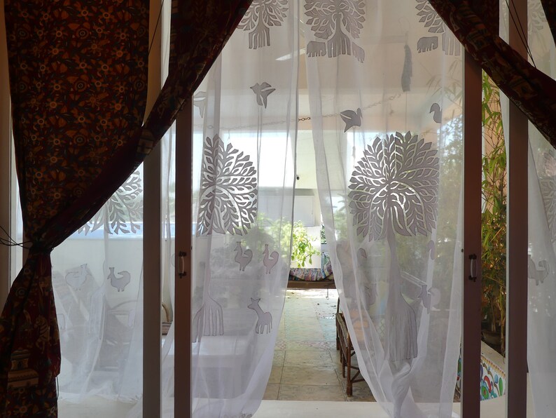 COTTON AND ORGANDI white with cutout and applique of a tree of life pattern