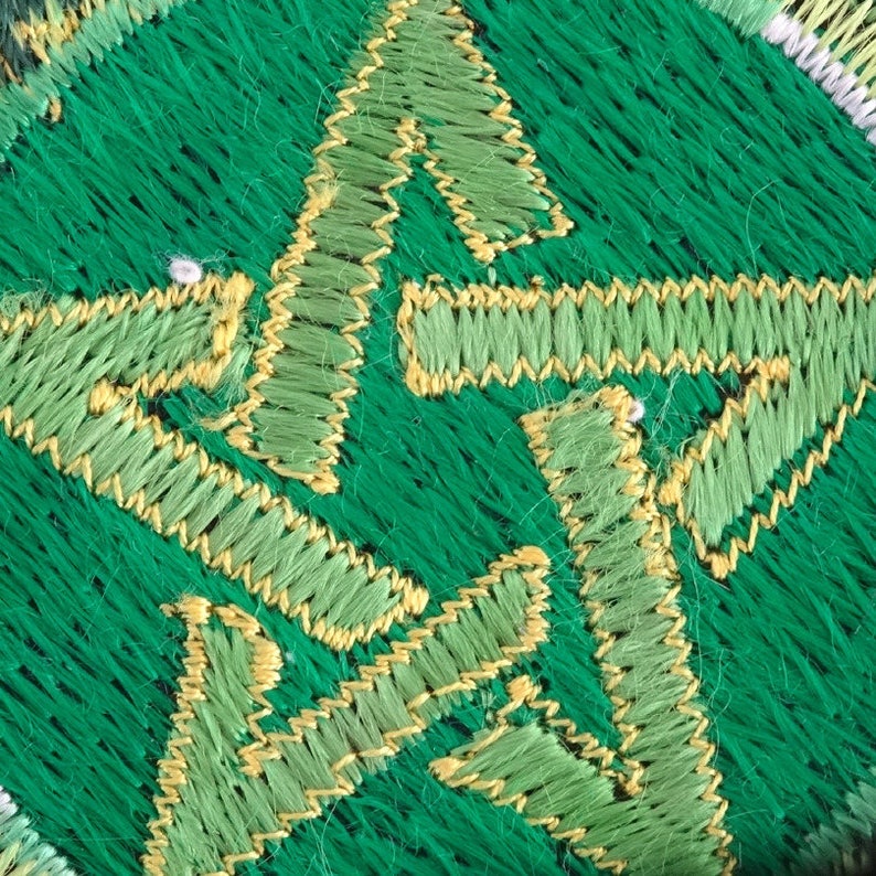 green and black Applique ethnic embroidery star pattern