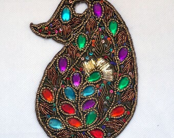 large fabric applique leaf with multicolored sequins