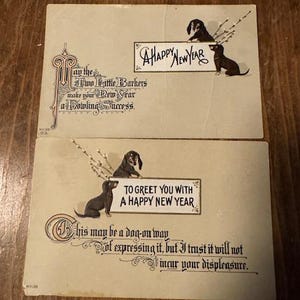 Set of 2 Vintage Dog Happy New Year Post Cards