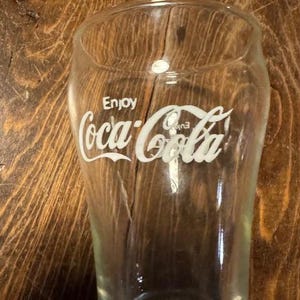 Set of 4 Vintage 1990s Enjoy Coke Coca-Cola Glass with Classic Lettering Retro Collectible Drinkware Nostalgic Coke Memorabilia.
