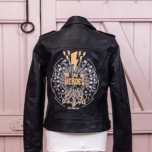Black biker jacket adorned with celestial bride embroidery, perfect for weddings