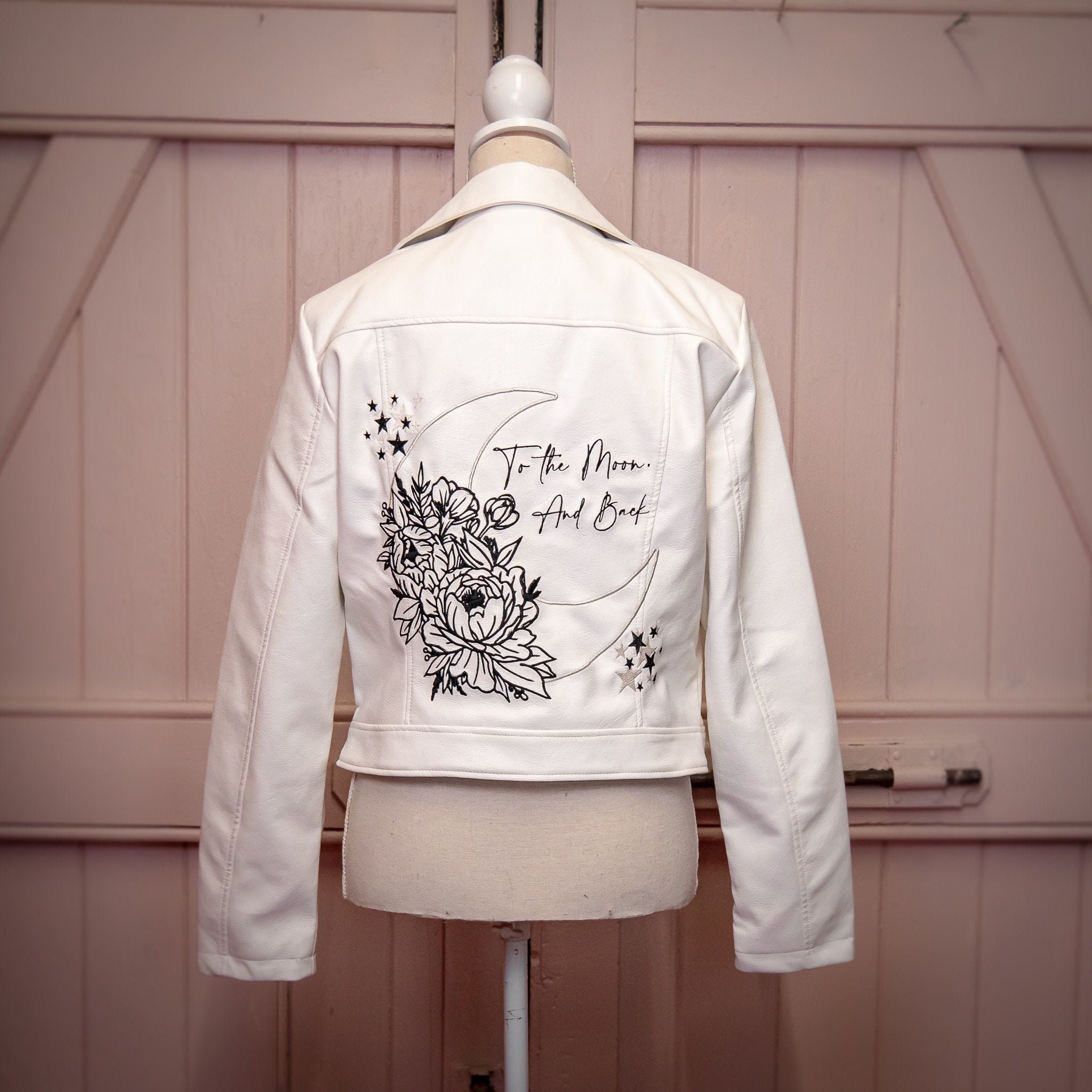 white embroidered leather jacket