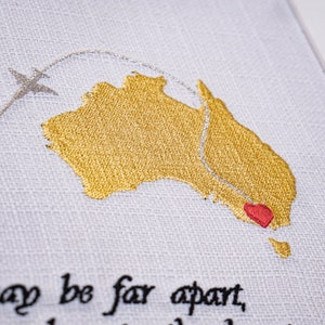 Thoughtful miss-you gift featuring an embroidered map of Australia and Ireland, symbolizing the closeness of hearts even when miles apart