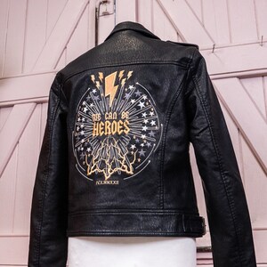 Embroidered wedding jacket featuring celestial motifs inspired by David Bowie's 'We Can Be Heroes'