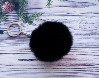 Llavero con pompón de piel sintética negra: llavero para coche, adorno para bolso