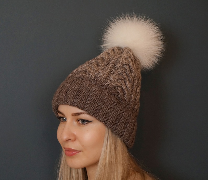 wool hat with fur pom pom