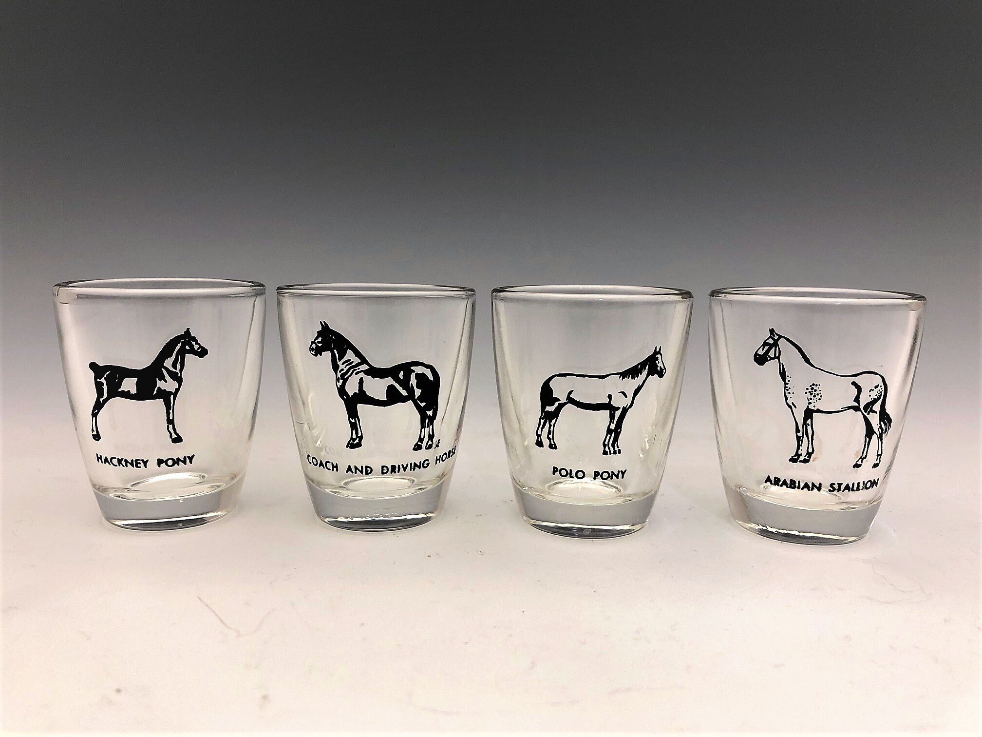 Collection of 8 Horse Shot Glasses