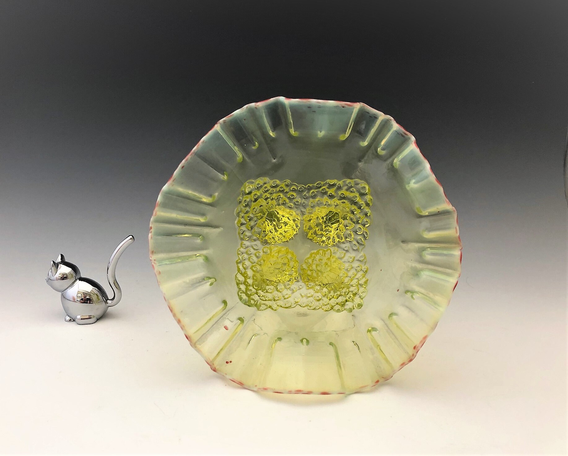 National Glass Fancy Fantails 4Footed Bowl Vaseline Glass Crimped