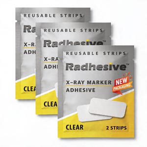 May include: Three silver packets of Radhesive X-Ray Marker Adhesive. Each packet has the words "REUSABLE STRIPS" at the top and "CLEAR" at the bottom. The packets have a yellow and white design.