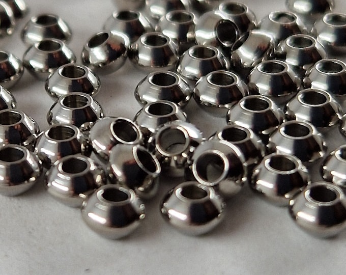 100 Stainless steel disc beads 4x2.5mm (Ø1.5mm) silver