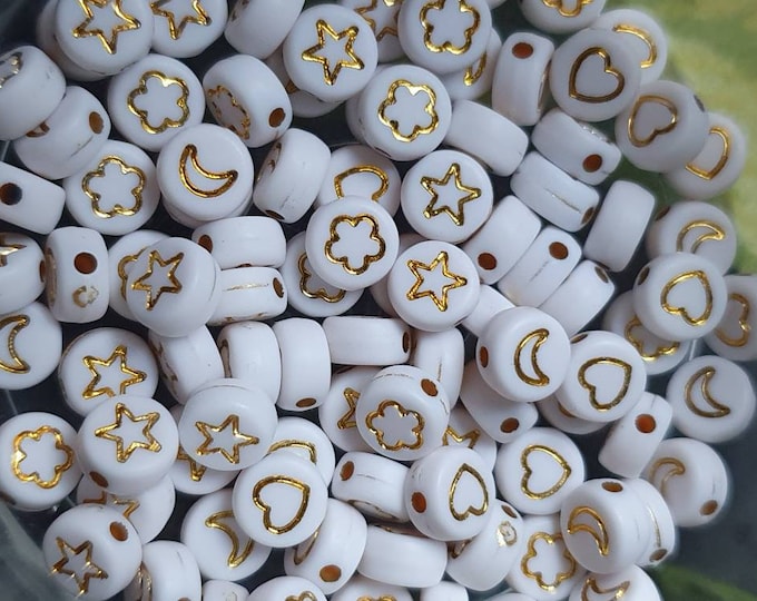 100 white pearls gold mix of icons 6 mm diameter hole size 1.4 mm