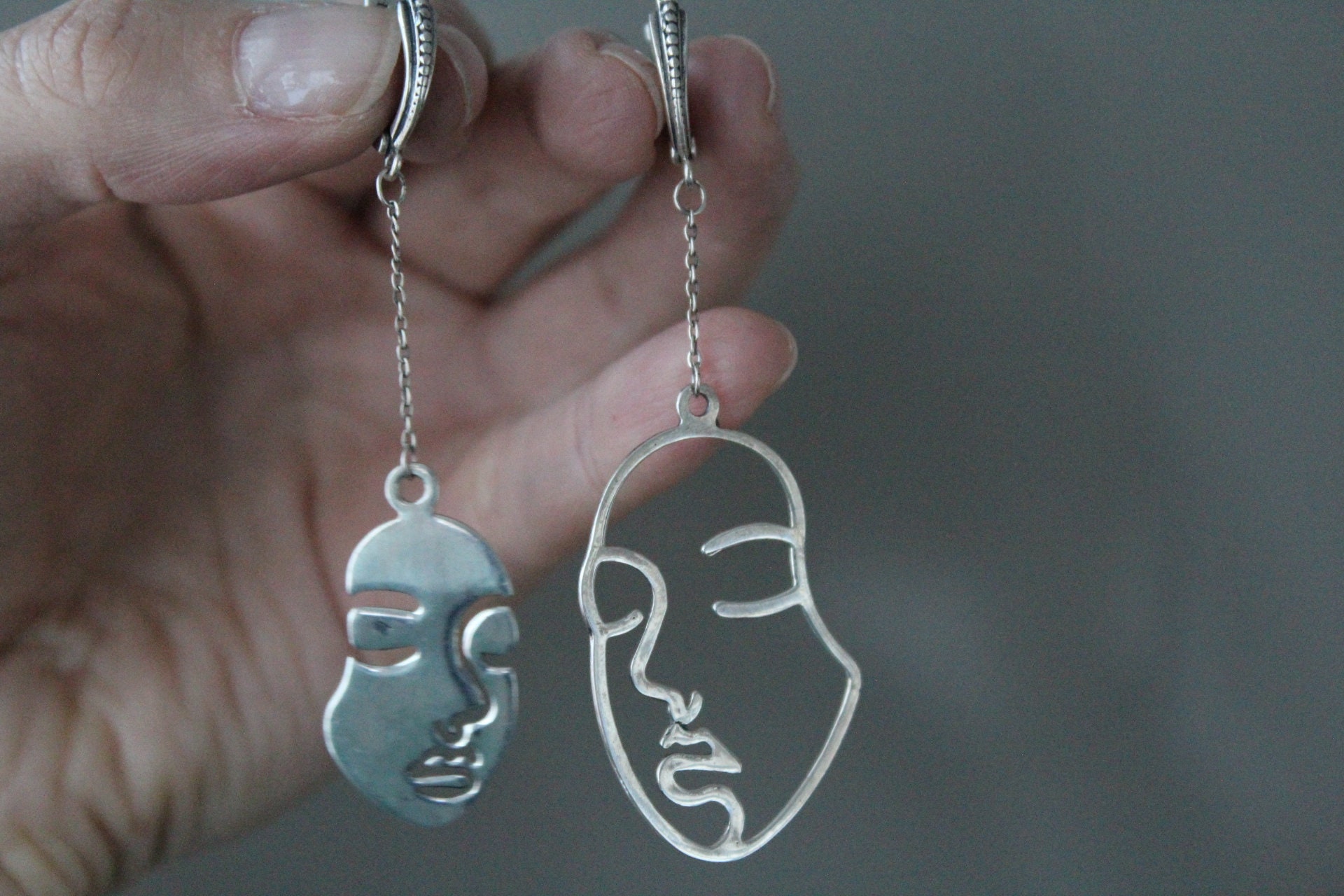 One line face on sale earrings