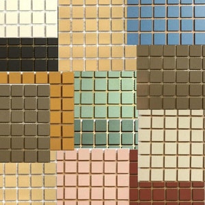 May include: A collection of 10 different coloured square tiles. The tiles are arranged in a grid pattern. The colours include beige, brown, light blue, green, pink, and red.