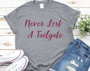 Tailgate Shirt l Never Lost A Tailgate Tee l College Football Shirt l Printed Cotton Tee l Classic Crew Neck Tee l Women's T-Shirt