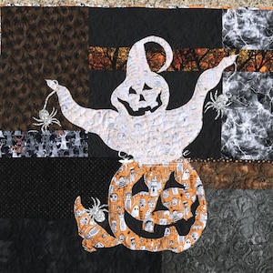 May include: A white ghost with a jack-o'-lantern face is holding a pumpkin with a black and white pattern. The ghost is surrounded by black and white spiderwebs and spiders.