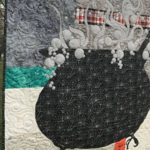 Close up outdoor photo of cauldron quilt.