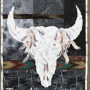 Bison skull applique and broderie perse quilt with title of pattnern.