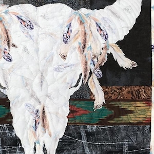 Detailed view of bison skull quilt.