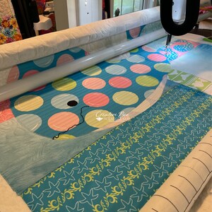 Bubbles the baby whale quilt being quilted by designer, Karla Kiefner of Creative Bee Studios.