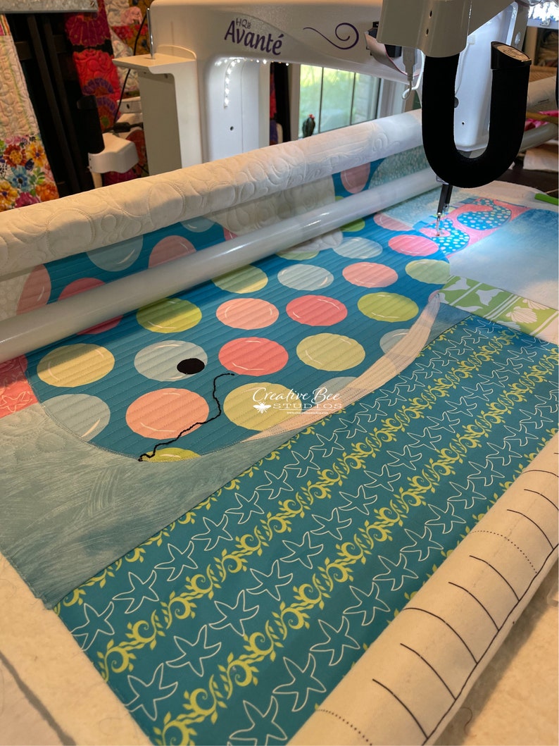 Bubbles the baby whale quilt being quilted by designer, Karla Kiefner of Creative Bee Studios.