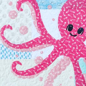 Close up view of PINKY the baby octopus applique quilt.