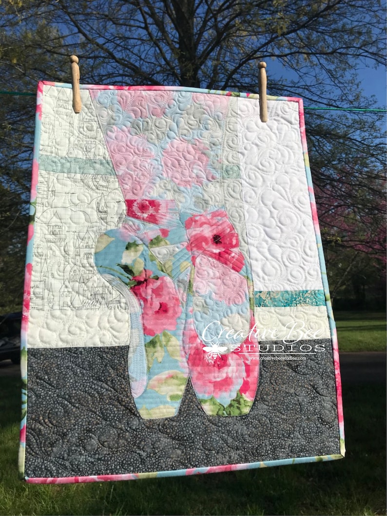 Angelina (ballerina) pointe shoes quilt made with both sides of one floral focus fabric.