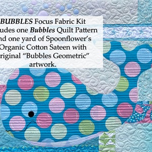 Image of baby whale quilt with description of focus fabric kit which includes one pattern and one yard of focus fabric.