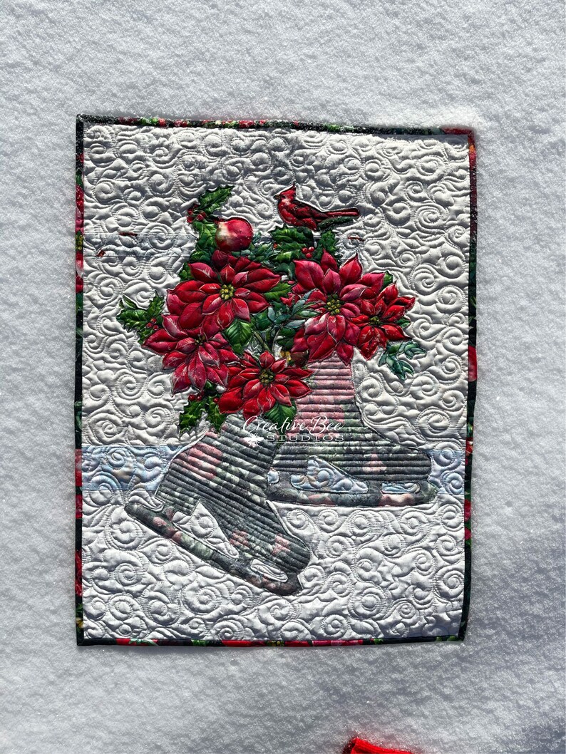 Snowy view of Noelle quilt.