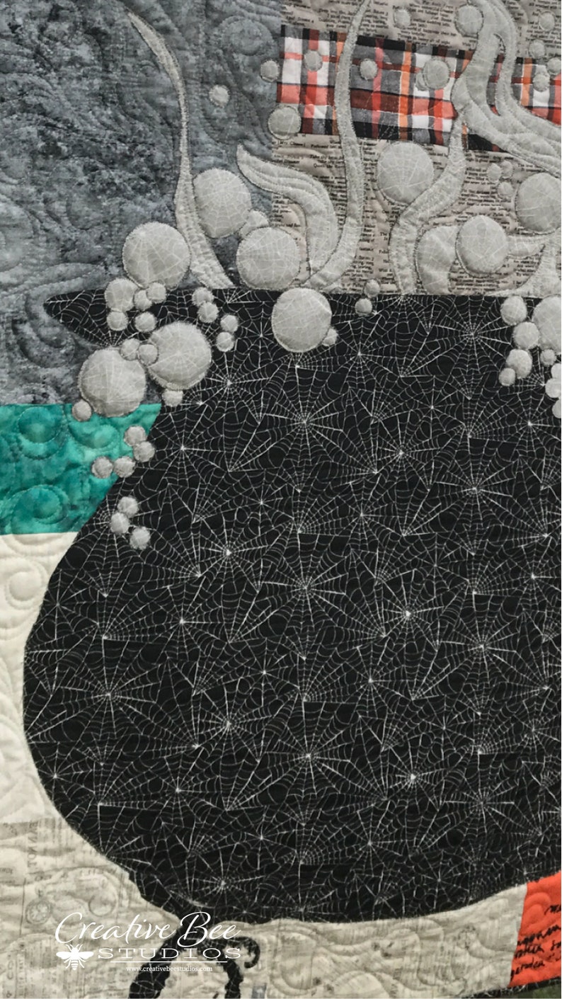 Close up view of steam and bubbles coming out of cauldron quilt.