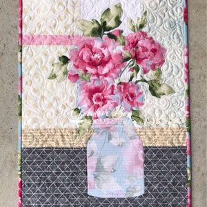 Image of original quilt made with the Grace Quilt Pattern using both beautiful sides of one focus fabric.