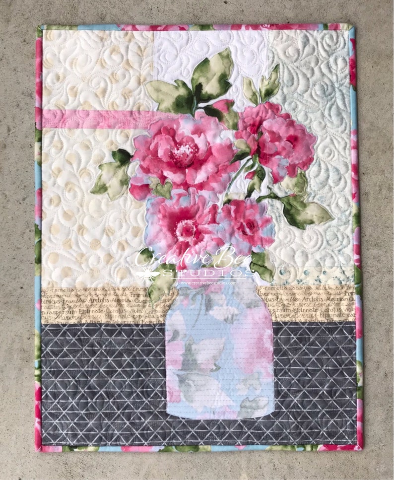 Image of original quilt made with the Grace Quilt Pattern using both beautiful sides of one focus fabric.