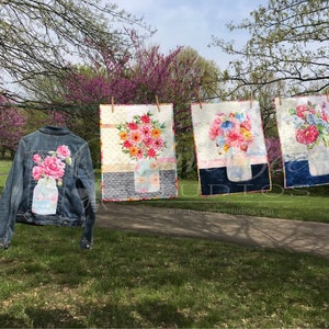 Image of three quilts a denim jacket with mason jar bouquet design using both sides of one focus fabric.