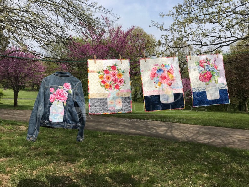 Image of three quilts a denim jacket with mason jar bouquet design using both sides of one focus fabric.