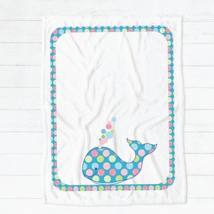 BUBBLES the Baby Whale artwork on white baby blanket.