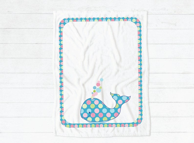 BUBBLES the Baby Whale artwork on white baby blanket.