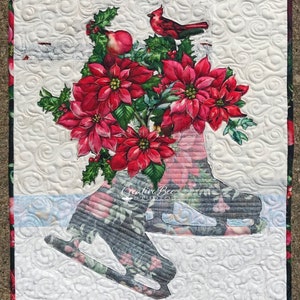 Noelle ice skates bouquet Christmas quilt.