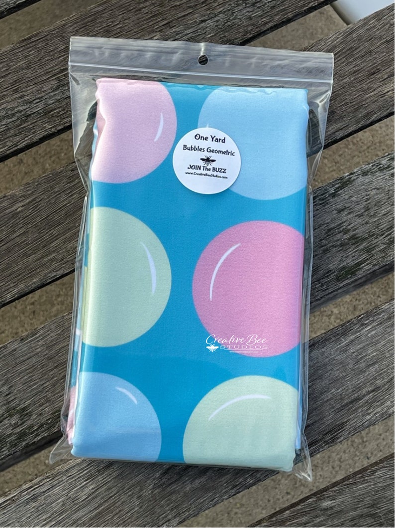 Package of One Yard of Bubbles Geometric focus fabric.