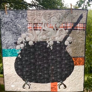 Outdoor sunset photo of bubbling cauldron quilt.