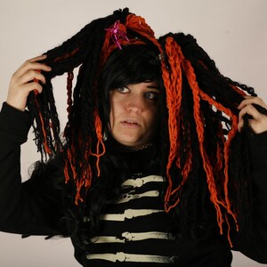 Orange And Black Hair Falls