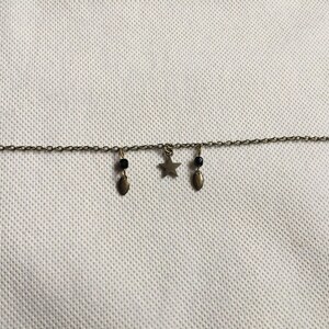 Bronze and black gems Bracelet: