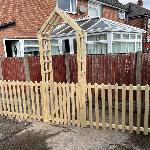 Garden arch with a gate and side picket fence. garden dog barrier. Message before purchasing to make sure I deliver to your area