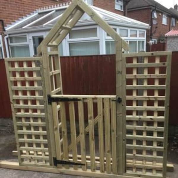 garden arch with side trellis. local delivery included other areas on request