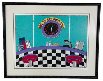 May include: A framed print of a diner scene with a clock that reads "Time to Eat Good Food". The diner has a black and white checkered floor, a purple counter, and two red and white stools.