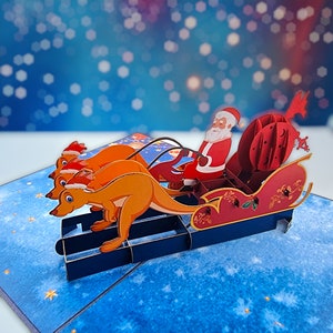 Carte pop-up traîneau kangourou de Noël